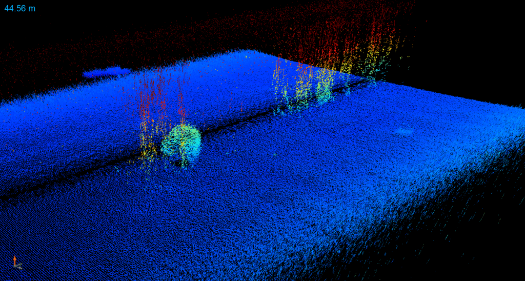 Preliminary point cloud data from a Trimble SX10 scanning total station set up on boulders on the shoreline of Agat facing inland to measure bank erosion at the shoreline in February 2023.